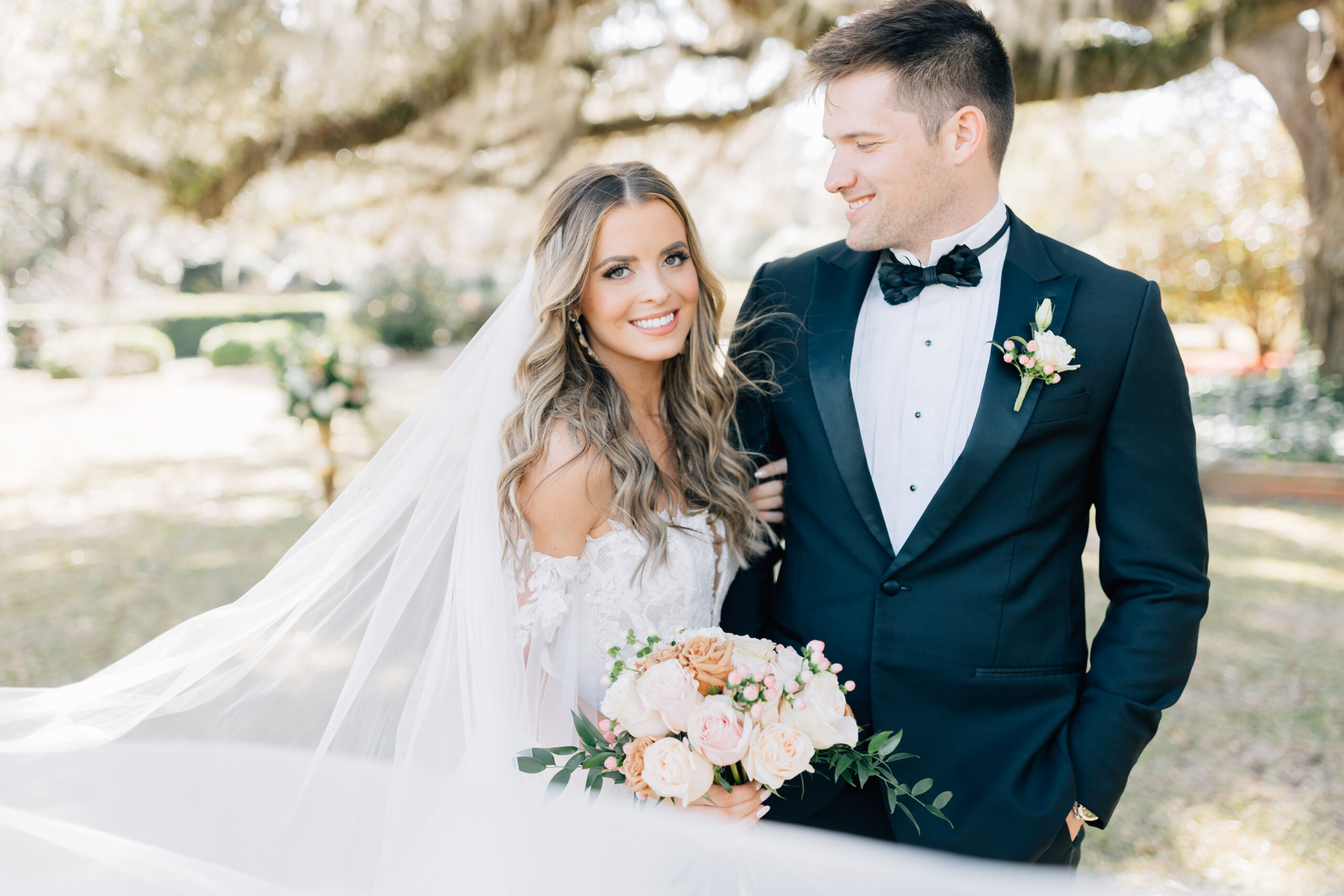 A luxury portrait of a bride and groom on their wedding day at Pebble Hill Plantation in Thomasville, Georgia.