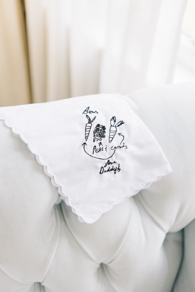 Photograph of the bridal handkerchief with a hand-embroidered sentimental meaning, a southern wedding tradition.