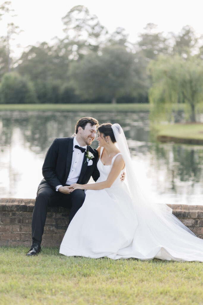 Bride and groom laughing together after their ceremony at a beautiful private plantation wedding in Albany, Georgia.